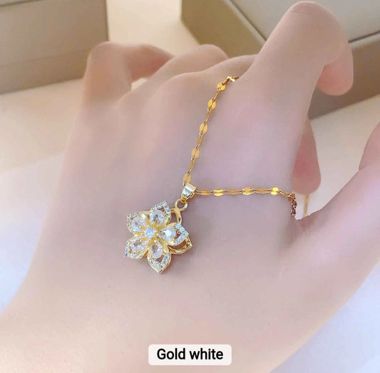 White and gold necklace